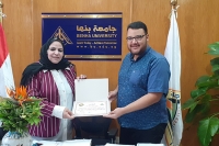 أمين عام جامعة بنها تكرم مندوب وزارة المالية